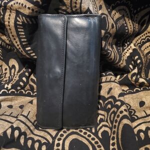 Beautiful soft leather wallet with loads of space for cards and multiple zippers